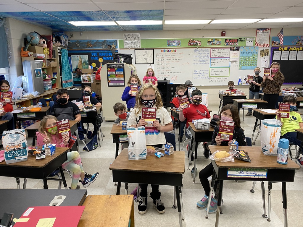 3rd graders with their dictionaries