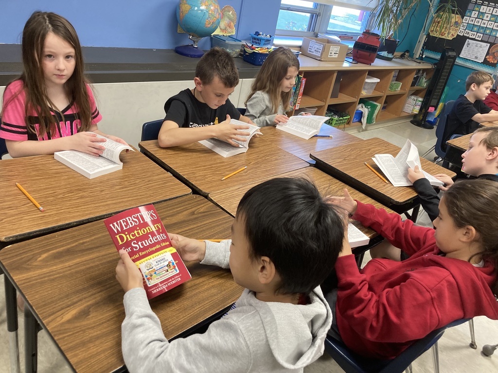 3rd grade get dictionary from Kiwanis club of Lapeer