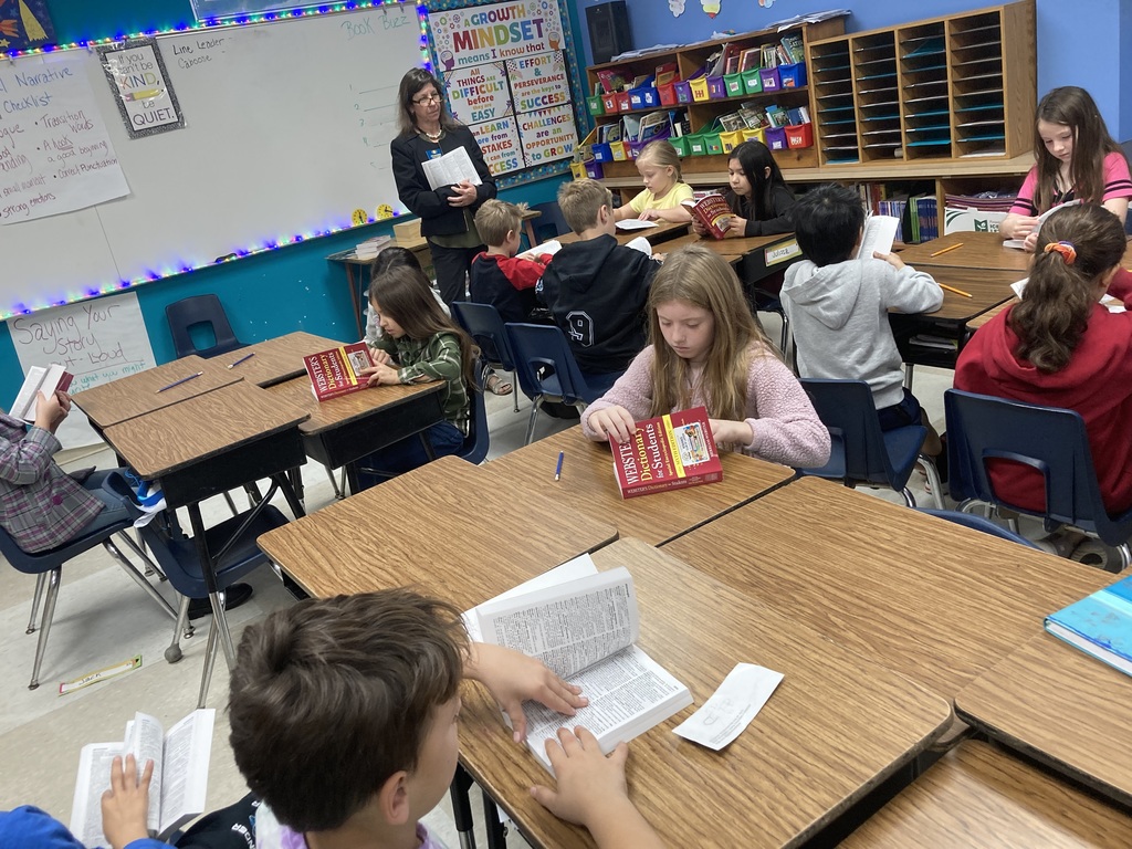 3rd grade get dictionary from Kiwanis club of Lapeer