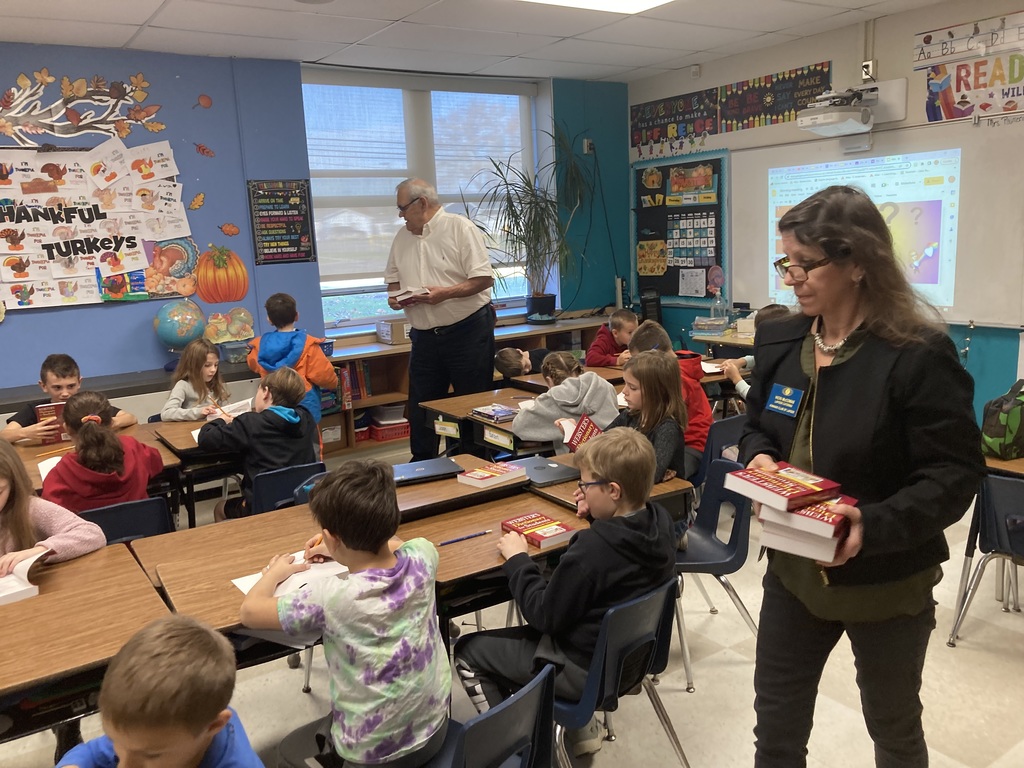 3rd grade get dictionary from Kiwanis club of Lapeer