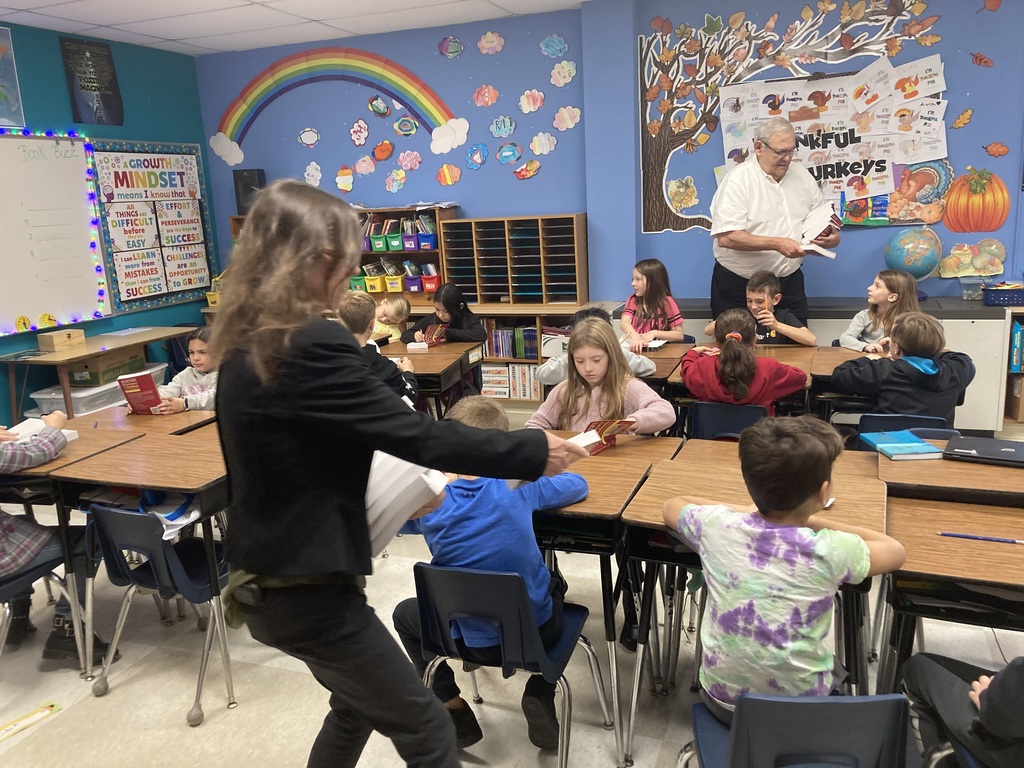 3rd grade get dictionary from Kiwanis club of Lapeer